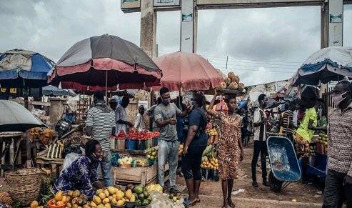 MORE HARDSHIP IN NIGERIA!!! Man Stabs Himself, Tries To Cut His Own Throat In Suicide Attempt At Delta Market