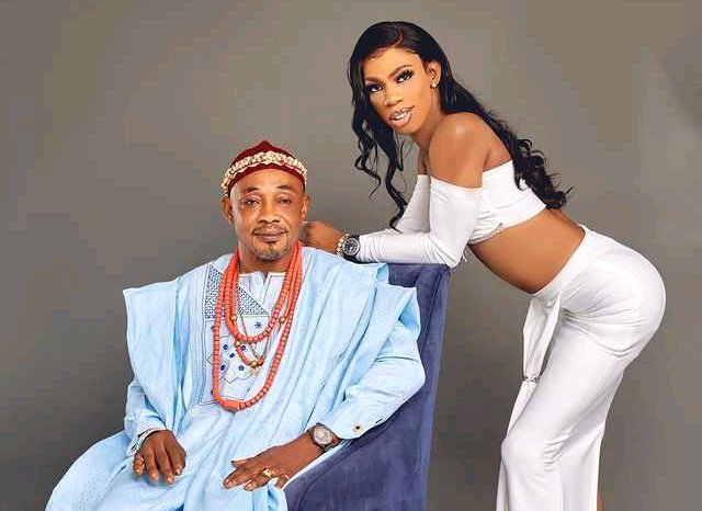 Nigerian Crossdresser James Brown Takes Photo with His Father As Governor's Aid Reacts