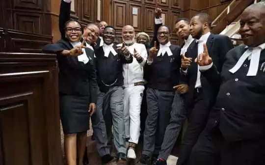 Reactions As IPOB Leader Strikes Joyous Pose With His Legal Team [PHOTOS]