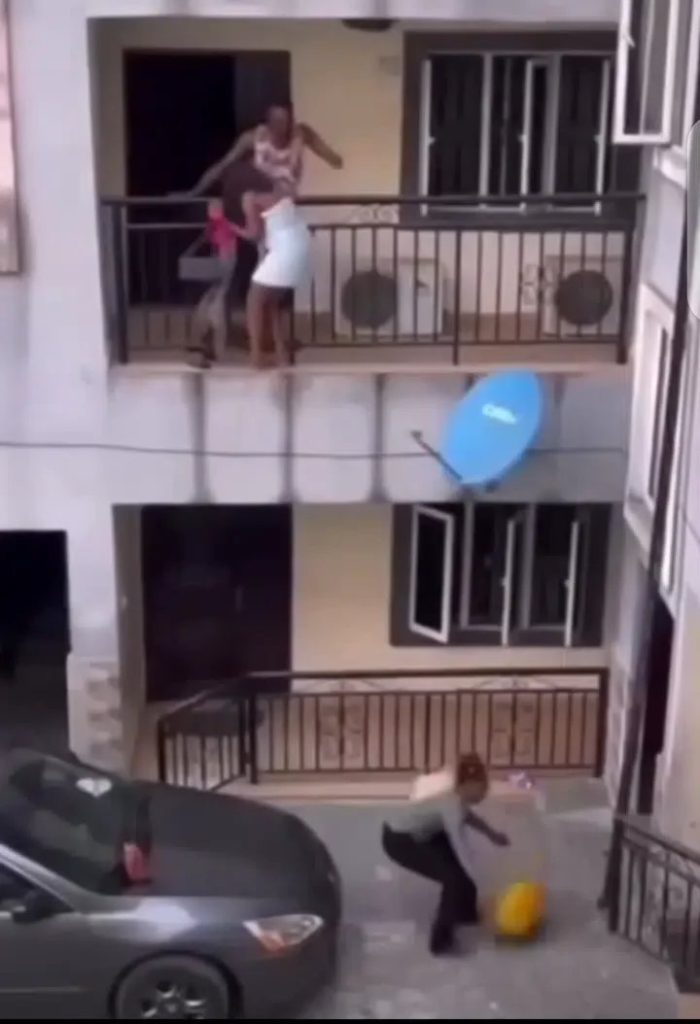 VIDEO: Please forgive me, it's my first time" - Side chick begs as wife forces her to jump down storey building after nabbing her with husband
