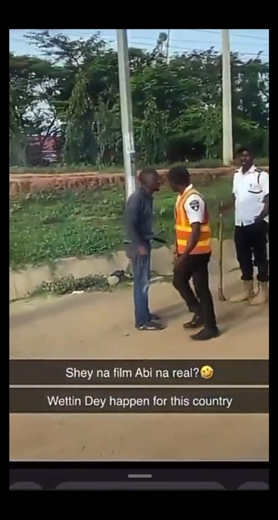 Startling Incident in Abuja: Angered Motorist Threatens V.I.O Officer with Loaded Gun