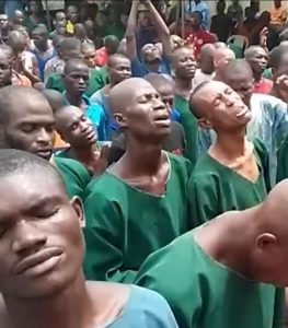 God is Love: Photos From Inside Nigerian Prison Show Inmates Turning to Christ During Worship Session