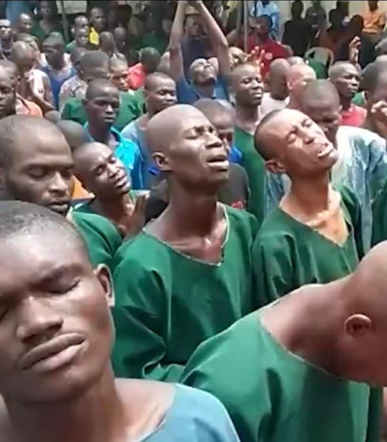 God is Love: Photos From Inside Nigerian Prison Show Inmates Turning to Christ During Worship Session