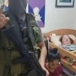 October 7 Attack: New Photo Shows Hamas Fighter Posing Moments Before Executing Bedridden Israeli Woman and Her Caregiver
