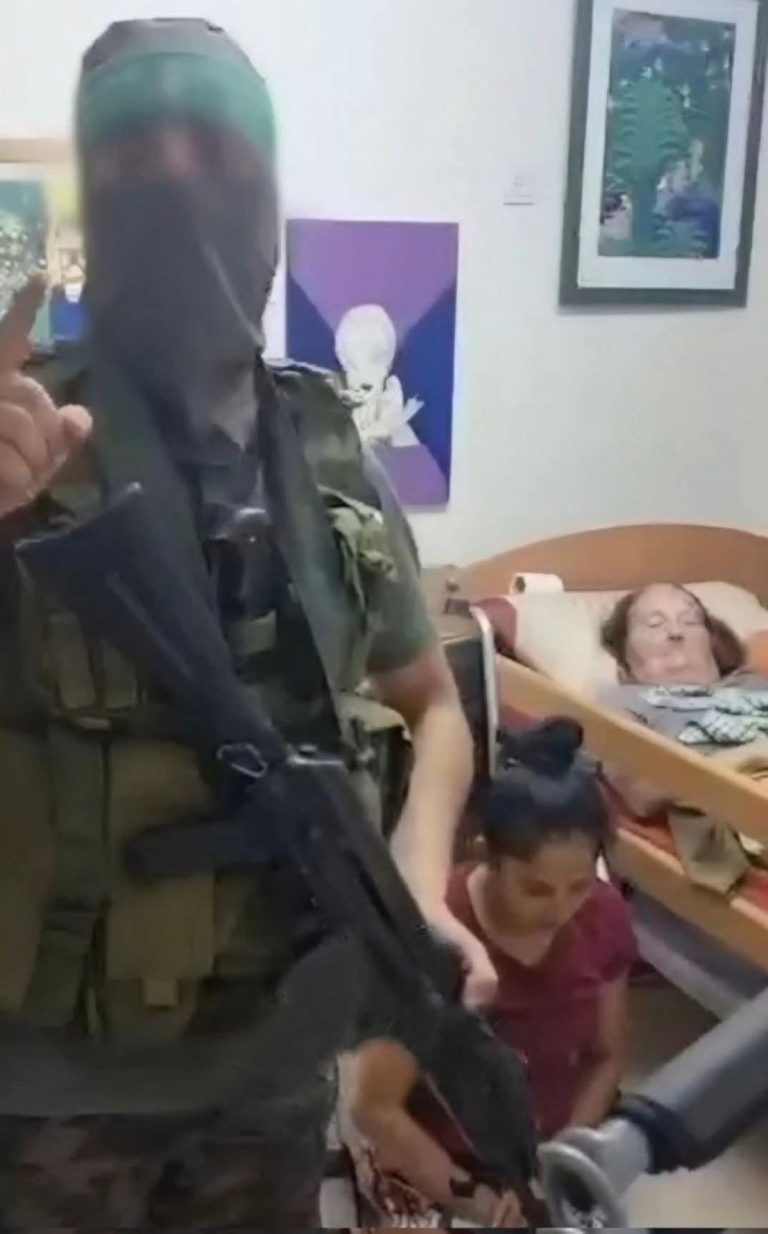 October 7 Attack: New Photo Shows Hamas Fighter Posing Moments Before Executing Bedridden Israeli Woman and Her Caregiver